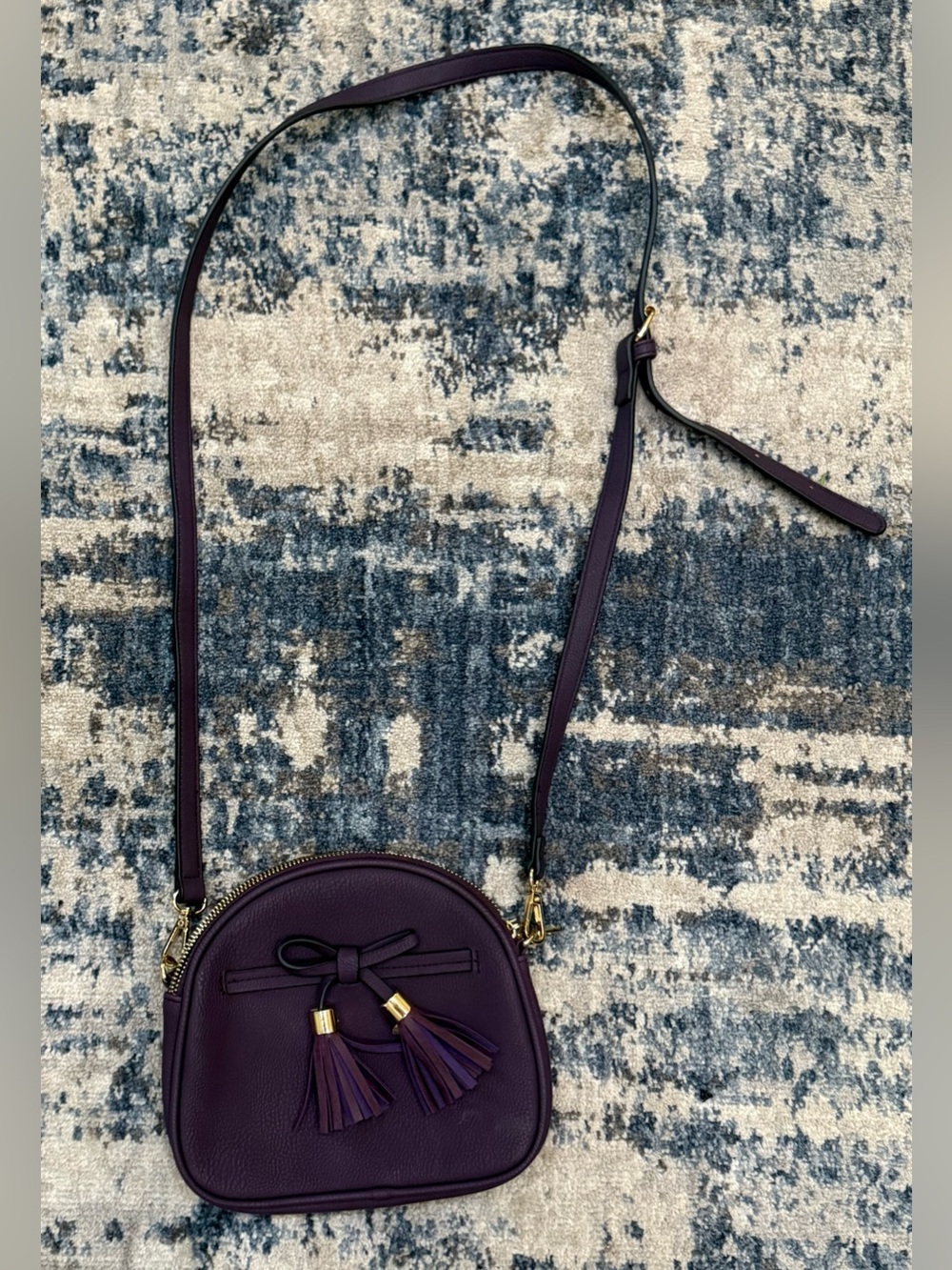Deep purple dome-shaped crossbody bag